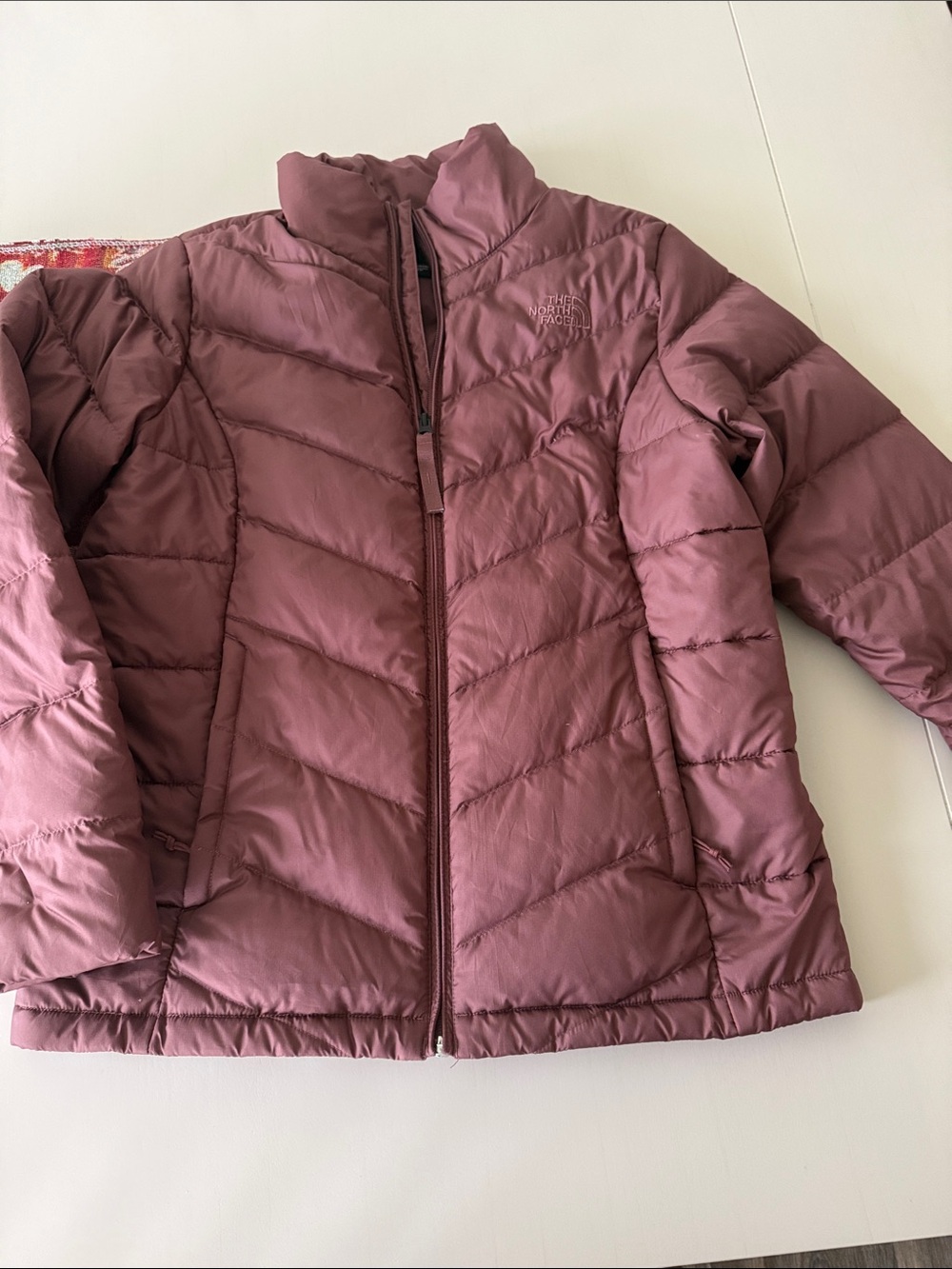 The North Face women’s Mauve-Pink Puffer Jacket